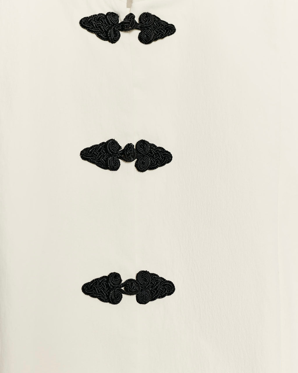 OFFSURGE Sleeveless Frog Closure Vest in Ivory